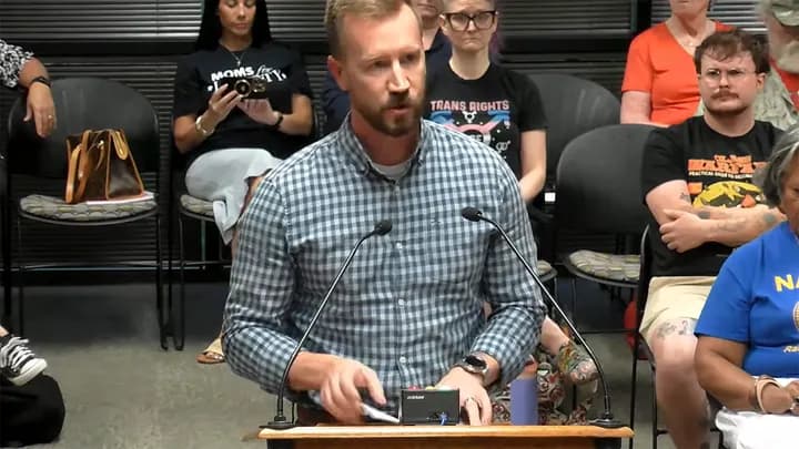 Photograph accompanying: They Told Him to "Just Homeschool" his kids amid trans teacher fight
